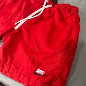 Men’s red Nike swimsuit, size Small